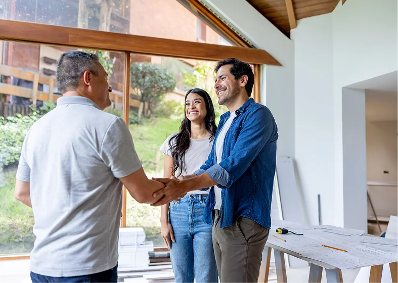 Home renovation consultation with couple and expert